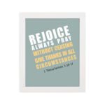 Rejoice always, pray without ceasing, give thanks in all circumstances 1 Thessalonians 5:16-17 Bible Wall Art with white and yellow text on muted teal background, bold design displayed on the wall in a white frame in a white background