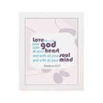 Love the Lord your God with all your heart, soul, and mind Matthew 22:37 Bible Wall Art with purple and teal text, abstract shapes, and leaf motifs on light cream background displayed on the wall in a white frame in a white background