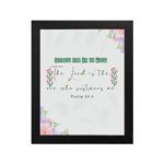 Psalm 54:4 Bible verse wall art with floral accents, green and red text, and a white background. hung on the wall in a black frame