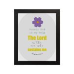 Psalm 54:4 Bible verse wall art with bold yellow text, purple flower, and light grey circular background pattern. hung on the wall in a black frame