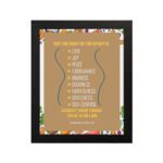 The Fruit of the Spirit Galatians 5:22-23 Bible wall art with blue and orange text, decorative border, and light brown background. hung on the wall in a black frame