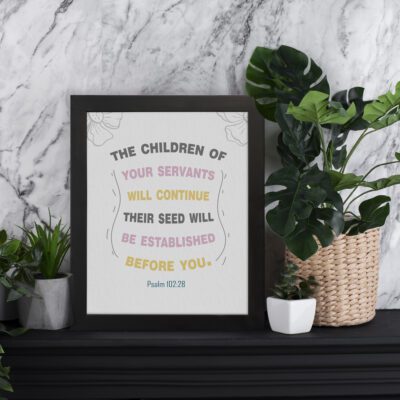 Psalm 102:28 Christian wall art with pastel colors, floral accents, and elegant design. displayed on the table in a black frame