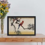 the vibrant beauty of a macaw perched on a pine branch in this vintage Ukiyo-e art print by Utagawa Hiroshige,placed on the wall