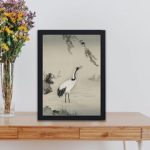 Discover the timeless beauty of a Japanese crane in this vintage art print by Kano Motonobu,placed on the wall