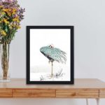 Discover the beauty of a White-naped Crane and New Year's Fern in this vintage art print by Numata Kashu,placed on the wall