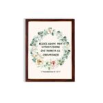 Rejoice always, pray without ceasing, give thanks in all circumstances 1 Thessalonians 5:16-17 Bible Wall Art with delicate floral wreath in pastel colors, light cream background