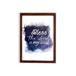 Bless The Lord O My Soul Psalm 103:1 Christian wall art with white text on a deep blue watercolor background. hung on the wall in a brown frame