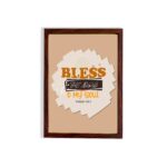 Infidu Bless The Lord O My Soul Psalm 103:1 Christian wall art featuring orange and black text on a beige background. hung on the wall in a brown frame