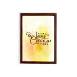 Jesus Christ Bible Wall Art in black script with a yellow cross and watercolor background, framed in black. Perfect Christian home decor. hung on the wall in a brown frame