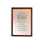 Cast Your Burden on the Lord Psalm 55:22 Bible verse wall art with teal lettering and soft peach background, Christian home decor. hung on the wall in a brown frame