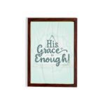 His Grace Is Enough Bible wall art with a mint background and teal script design, surrounded by decorative elements. hung on the wall in a brown frame