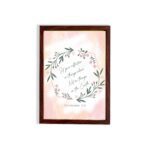 Infidu Set Your Affection On Things Above Bible Wall Art with floral wreath and pink background. hung on the wall in a brown frame