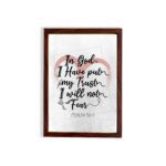 In God I Have Put My Trust, I Will Not Fear Psalm 56:4 Bible Verse Wall Art with pink watercolor arc and black frame. hung on the wall in a brown frame