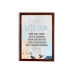 Christian wall art displaying Proverbs 2:6 with a blue gradient background and the word "Wisdom" in elegant lettering. hung on the wall in a brown frame