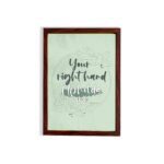 Your Right Hand Upholds Me Psalm 63:8 Christian wall art with dark gray text and light green floral elements on a pale green hung on the wall in a brown frame background.