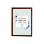 Your Right Hand Upholds Me Psalm 63:8 Christian wall art with a hand illustration and floral accents on a light gray background. hung on the wall in a brown frame