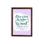 Christian wall art with Getting Wisdom Is The Wisest Thing You Can Do Proverbs 4:7, green text, light purple background, and decorative swirls. hung on the wall in a brown frame