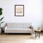 Bible wall art with Acts 2:21 verse, featuring pastel polka dots and bold text, designed to inspire and uplift your home decor. displayed on the wall in a brown frame