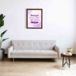 Bible wall art featuring Psalm 63:3 with playful text in purple and pink on a lavender background. displayed on the wall in a brown frame