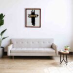 Infidu Jesus Christ Bible Wall Art featuring a black cross and gold lettering on a light gray background. Perfect for home decor. displayed on the wall in a brown frame