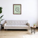 In God I Have Put My Trust, I Will Not Fear Psalm 56:4 bold Christian wall art with green background and brushstroke lettering displayed on the wall in a brown frame