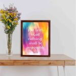 Wall art featuring the verse For with God nothing shall be impossible from Luke 1:37, designed with a colorful watercolor background. displayed on the wall in a brown frame