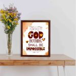 Bible wall art featuring Luke 1:37, with playful text and a warm brown background. Perfect for Christian home decor. displayed on the table in a brown frame