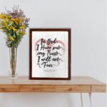 In God I Have Put My Trust, I Will Not Fear Psalm 56:4 Bible Verse Wall Art with pink watercolor displayed on the table in a brown frame