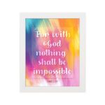 Wall art featuring the verse For with God nothing shall be impossible from Luke 1:37, designed with a colorful watercolor background. hung on the wall in a white frame