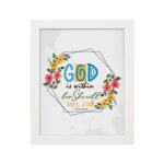 God Is Within Her She Will Not Fall Psalm 46:5 Bible Verse Wall Art with colorful flowers and modern design hung on the wall in a white frame