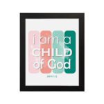 Infidu I Am A Child Of God John 1:12 Christian Wall Art with modern pink and green gradient design on a playful background. hung on the wall in a black frame