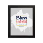 Bless The Lord O My Soul Psalm 103:1 Christian wall art in bold blue and orange, with a light gray background and splash design. hung on the wall in a black frame