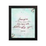 Because Your Love Is Better Than Life Psalm 63:3 Bible Verse Wall Art with soft blue background and floral accents. hung on the wall in a black frame