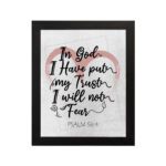 In God I Have Put My Trust, I Will Not Fear Psalm 56:4 Bible Verse Wall Art with pink watercolor arc and black frame. hung on the wall in a black frame