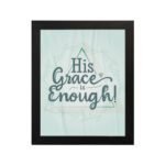 His Grace Is Enough Bible wall art with a mint background and teal script design, surrounded by decorative elements. hung on the wall in a black frame