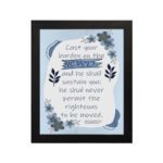 Christian wall art featuring Psalm 55:22 with navy blue text on a light blue and white background, decorated with blue flowers. hung on the wall in a black frame