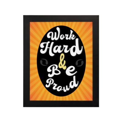 Work Hard Be Proud office wall art with white text on a black effect background gradient of orange and yellow, framed in black hanging on the wall. Perfect for home office decor.