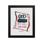 Wall art with the text 'God Is Within Her, She Will Not Fall' in colorful fonts, surrounded by pink blossoms and a wooden frame. hung on the wall in a black frame