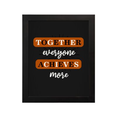 Infidu motivational quotes wall art featuring Together Everyone Achieves More on a dark black background and black frame hung on the wall. Perfect for inspiring your workspace.