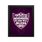 The Lord Remembers Us and Will Bless Us Psalm 115:12 Bible Verse Wall Art in bold white text on a deep purple background. hung on the wall in a black frame