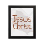 Jesus Christ Bible wall art with hand-drawn brown lettering and a minimalist white-gray watercolor background in a black frame. hung on the wall in a black frame