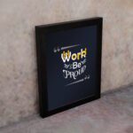 Infidu Work Hard Be Proud office wall art featuring motivational quotes on a navy blue background and black frame on the wall. Perfect for home offices and study areas.