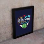 Infidu If The Plan Doesn't Work Change The Plan But Never The Goal wall art with a navy blue background red heart design and black frame on the wall. Inspiring decor for home offices and workspaces.