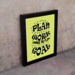 Infidu If The Plan Doesn't Work Change The Plan But Never The Goal wall art with a light green background and dark blue star design and black frame on the wall. Inspiring decor for home offices and workspaces.