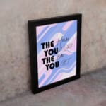 Infidu motivational quotes wall decor featuring The Harder You Work The Better You Get on a mixed white, pink, and navy blue background on the table. Perfect for inspiring your workspace.