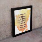 Set Your Affection on Things Above Colossians 3:2 Bible Verse Wall Art with subtle cross and watercolor background. displayed on the wall in a black frame