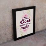 Floral watercolor 'For With God Nothing Shall Be Impossible' Luke 1:37 Bible verse wall art. displayed on the wall in a black frame