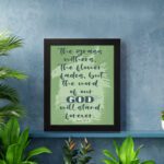 Christian wall art featuring Isaiah 40:8 with dark green and black text on a light green background. displayed on the wall in a black frame