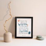 Bible verse wall art displaying From the Rising of the Sun to the Place Where It Sets, The Name of the Lord Is to Be Praised. displayed on the wall in a black frame