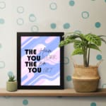 Infidu motivational quotes wall decor featuring The Harder You Work The Better You Get on a mixed white, pink, and navy blue background on the table. Perfect for inspiring your workspace.